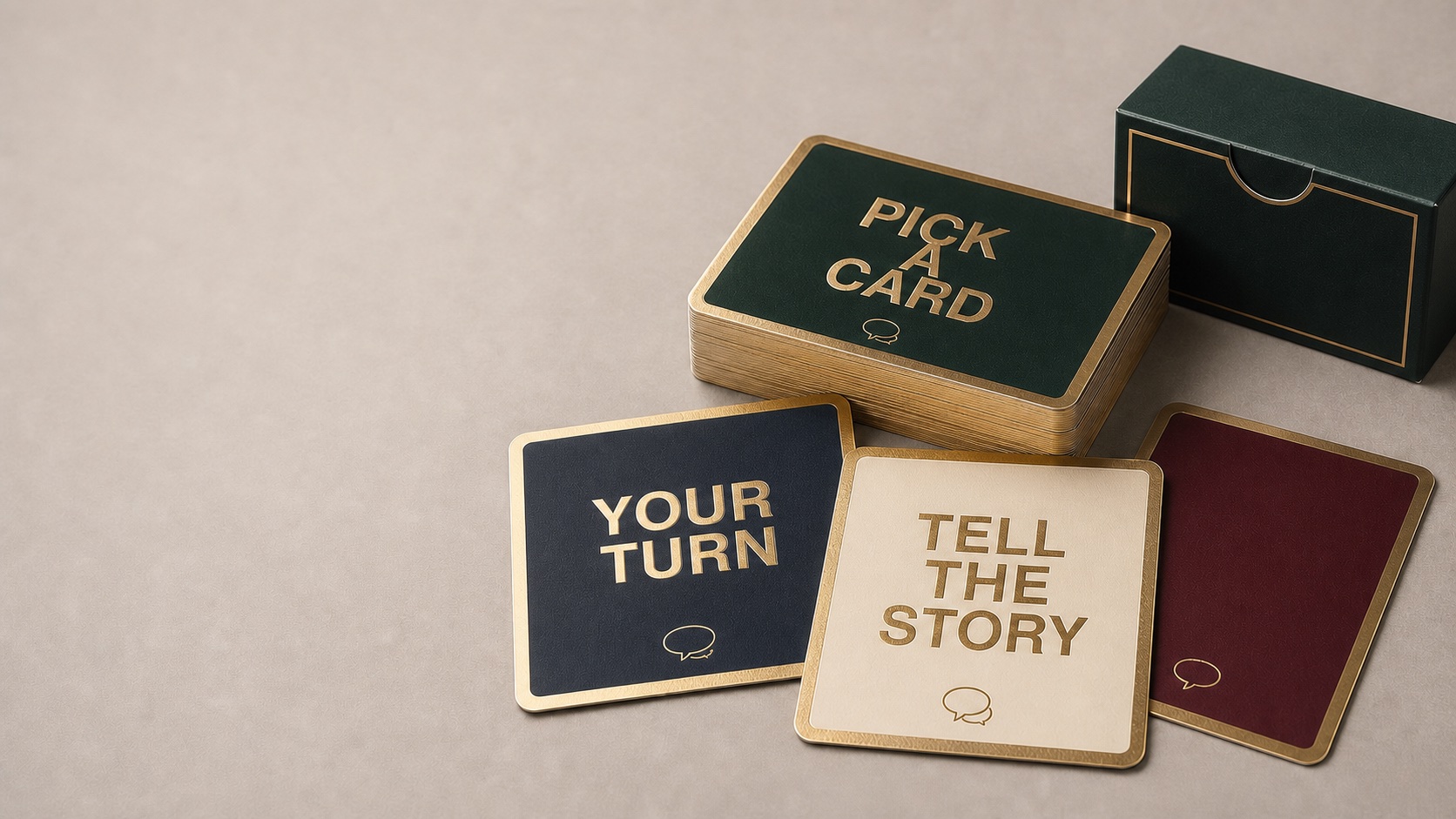 Luxury custom conversation card deck with emerald, navy, ivory and ruby cards in a rigid box